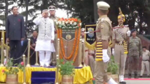 Governor Shiv Pratap Shukla taking the salute of the march past.
