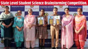 Teachers of The Scholars Home School congratulating Bhuvan Chauhan and Sanvi Asati.