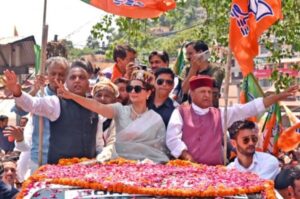 IMAGE: Bharatiya Janata Party candidate from Mandi Kangana Ranaut with the Leader of Opposition in Himachal Pradesh Assembly Jairam Thakur and party state president Rajiv Bindal hold her nomination roadshow for Lok Sabha polls, in Mandi on May 14, 2024. Photograph: ANI Photo
