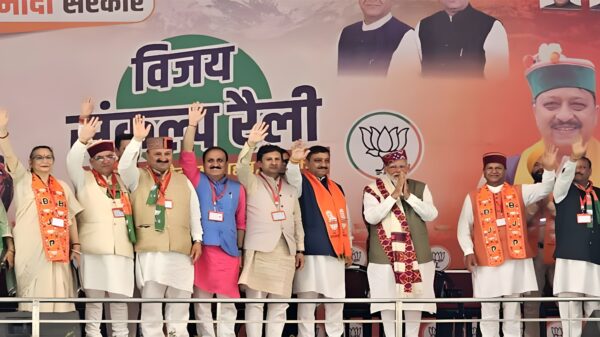 PM Modi with BJP leaders on the stage.