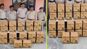 Police team with recovered illegal liquor.