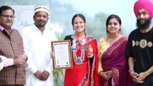 Honoring Vaishali Bisht with a certificate