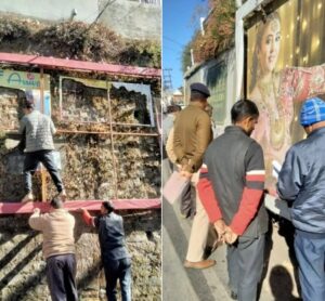 Municipal employees removing hoardings installed without permission in BCS